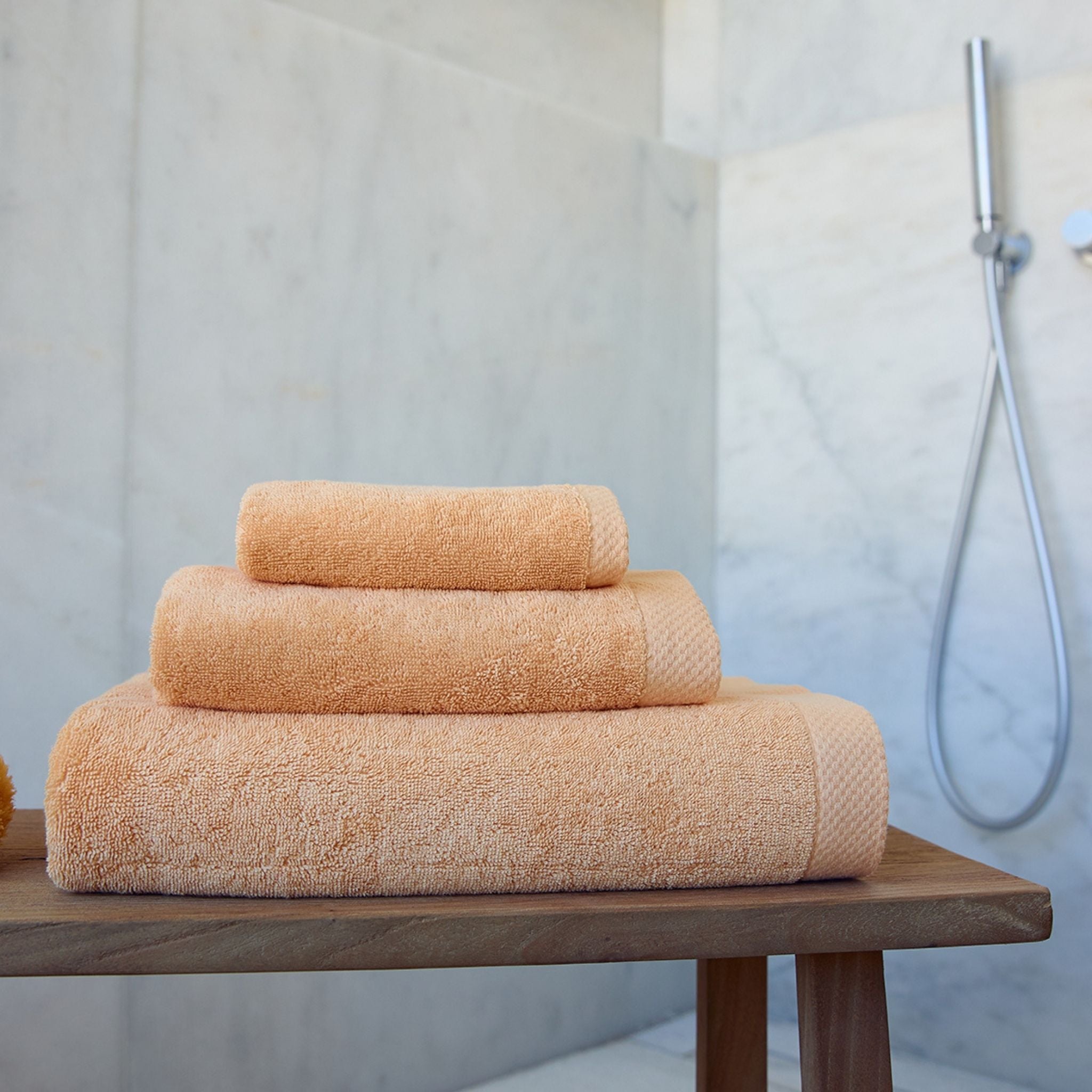 torres-novas-bath-luxus-plain-bath-towel-light-orange-lifestyle-1.jpg