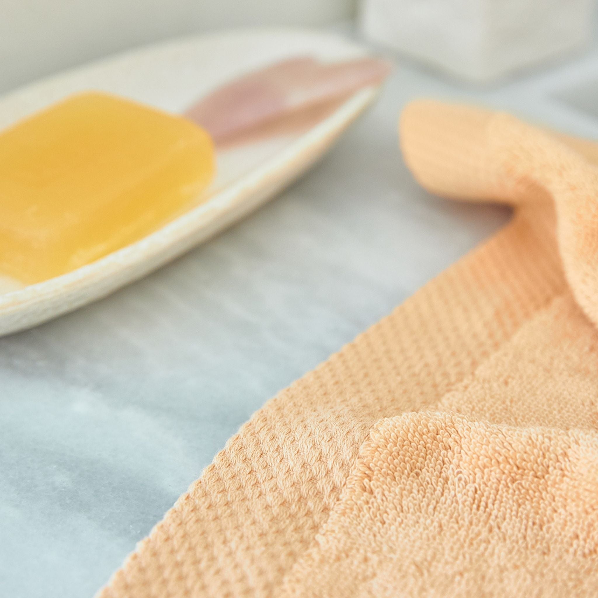 torres-novas-bath-luxus-plain-bath-towel-light-orange-lifestyle-2.jpg