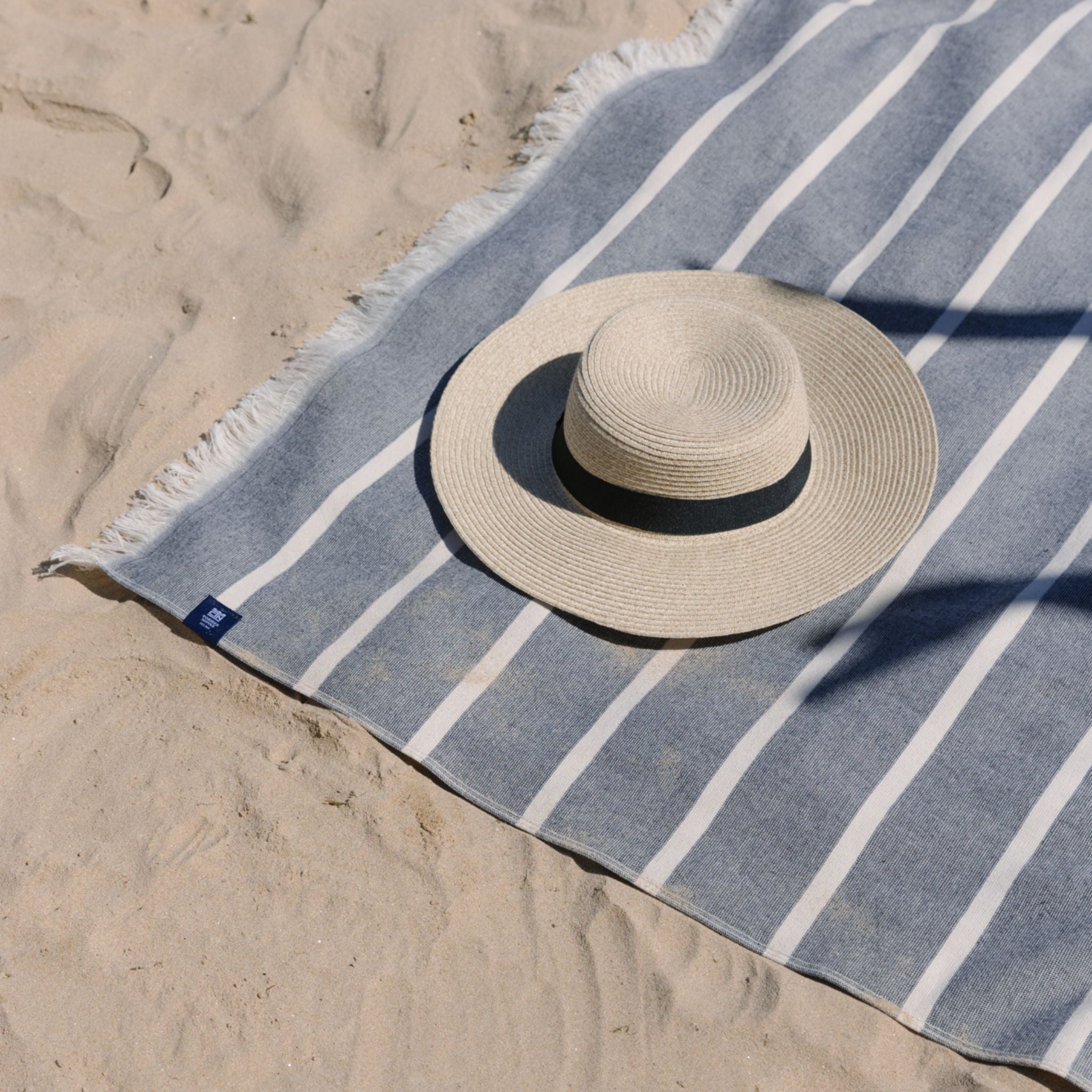 torres-novas-beach-belem-horizontal-stripes-towel-black-lifestyle-2.jpg