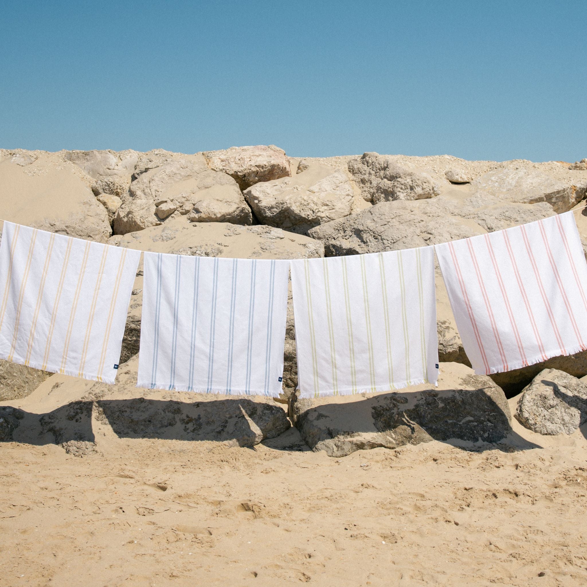 torres-novas-beach-caparica-vertical-stripes-towel-multiple-colours-lifestyle-2.jpg