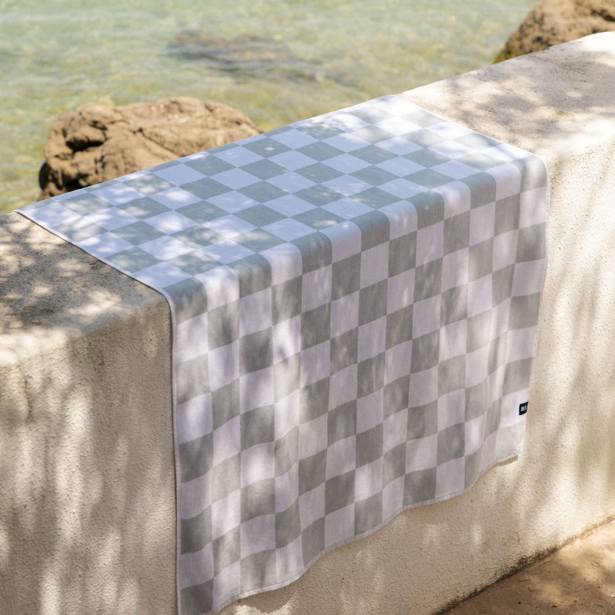 torres-novas-beach-chequered-gibalta-checkers-towel-grey-lifestyle-3.jpg