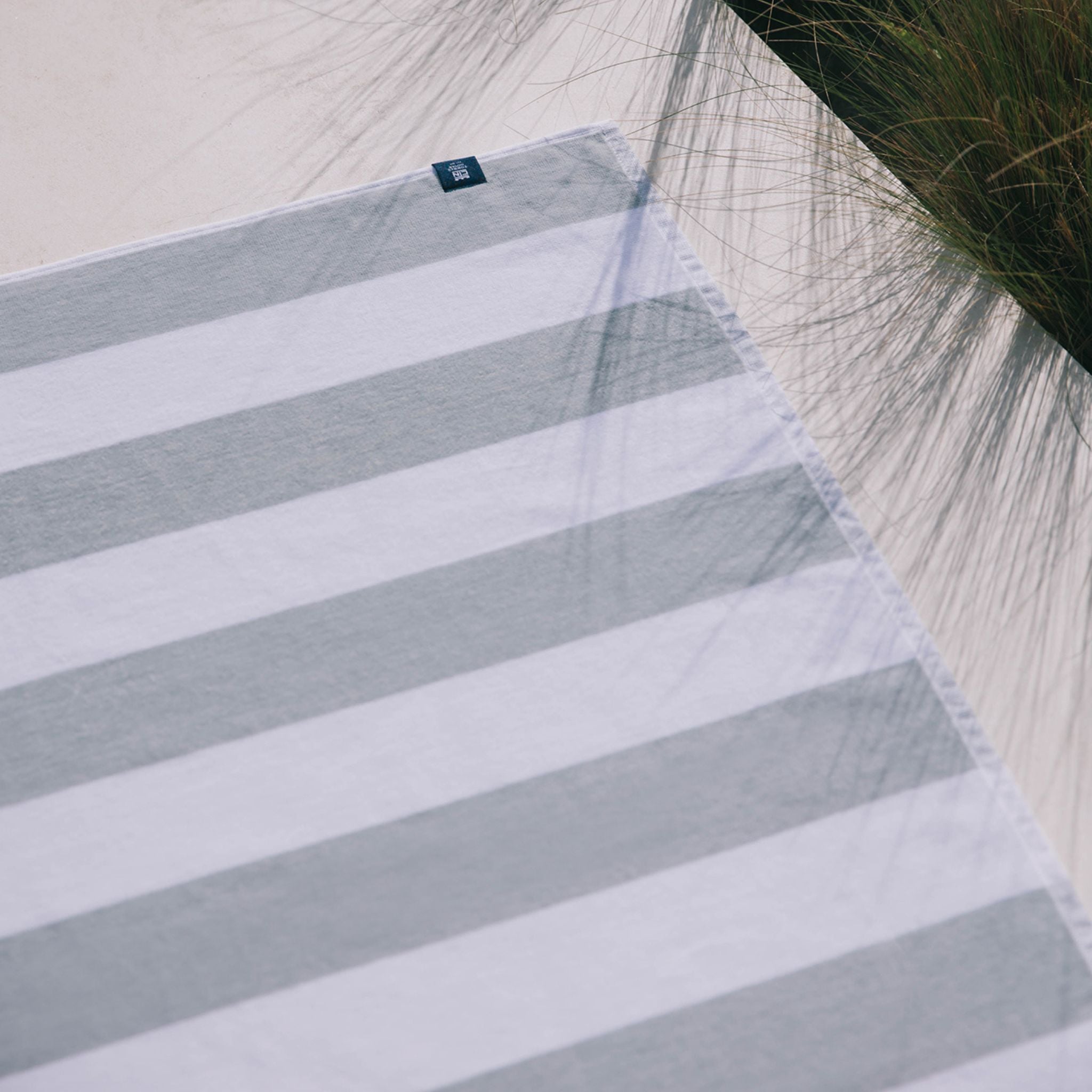 torres-novas-beach-gibalta-vertical-stripes-towel-grey-lifestyle-2.jpg