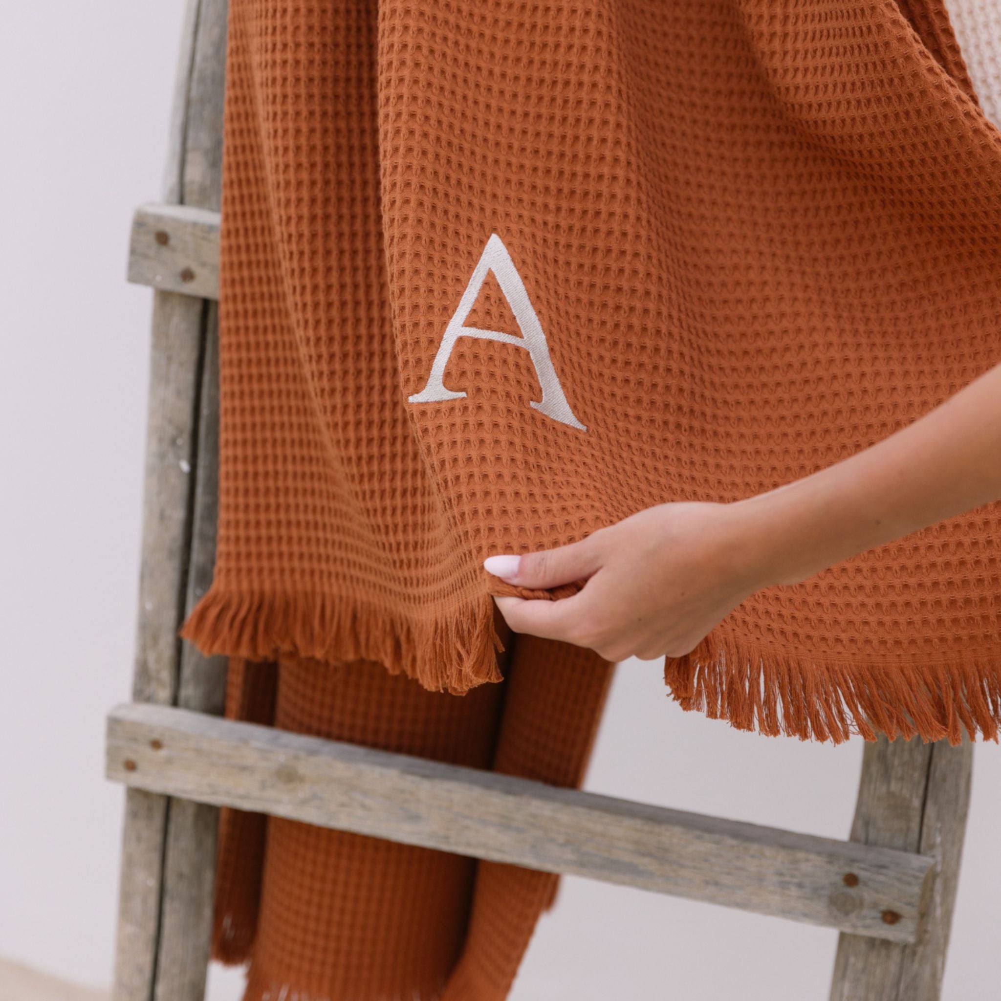 torres-novas-beach-santana-waffle-towel-terracotta-lifestyle-1.jpg